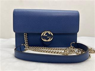 Gucci Interlocking G Clutch Wallet in blue, chained crossbody